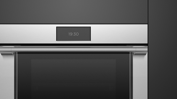 Front View of a Stainless Steel Professional Style Oven.